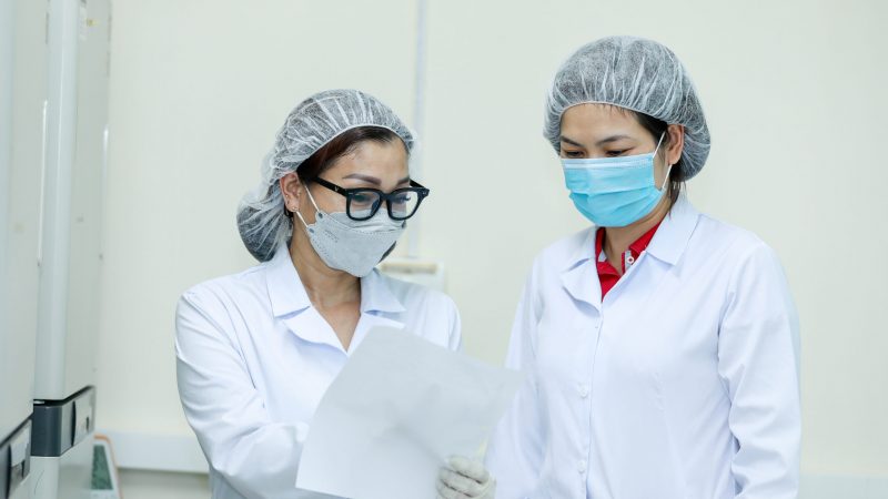 In Viet Nam, Laboratory Technicians Nguyen Thi Kim Chung (left) and Pham Thi-Trang (right) read a slide to identify bacteria species as part of FHI 360’s work for the Fleming Fund, which supports the country in collecting, analyzing, sharing and using high-quality data on antimicrobial resistance. 

Photo credit: Vu Ngoc Dung for FHI 360.
